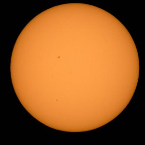 The planet Mercury is seen in silhouette, lower third of image, as it transits across the face of the sun Monday, May 9, 2016, as viewed from Boyertown, Pennsylvania.  Mercury passes between Earth and the sun only about 13 times a century, with the previous transit taking place in 2006.  Photo Credit: (NASA/Bill Ingalls)